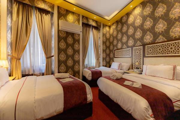 Deluxe Dreibettzimmer